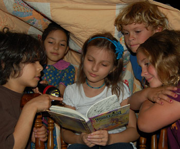 4KidReadingUnderQuilt2